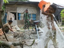 Mandi di Tengah Pembangunan : Antusiasme Anak-anak Bukit Pala Sambut Air Bersih