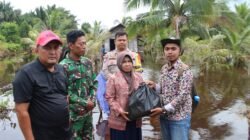 PT NSP Salurkan 158 Paket Sembako dan Lakukan Penanganan Banjir di Teluk Buntal